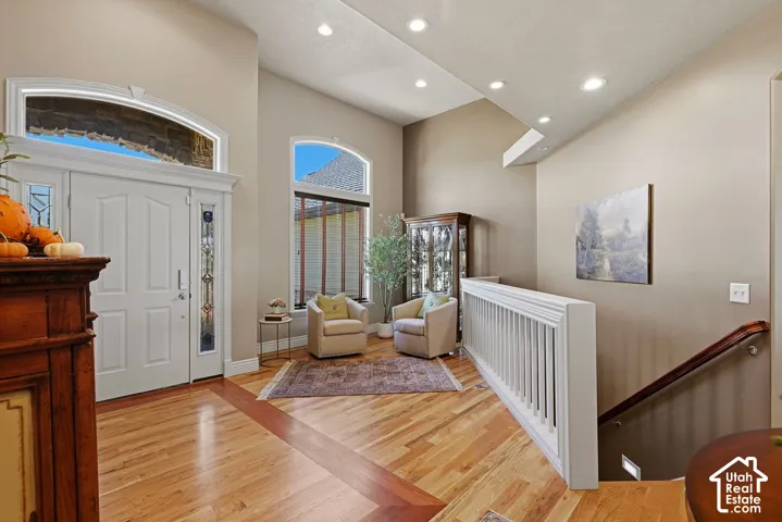 Welcoming entryway with hardwood flooring