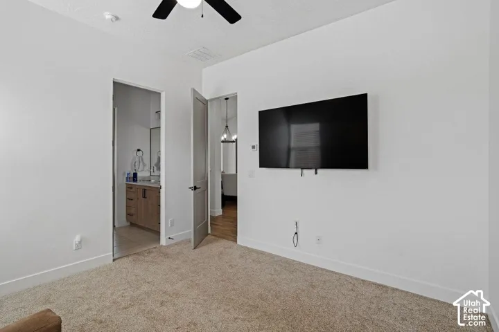 Ceiling fan fixture and wall-mounted television bracket