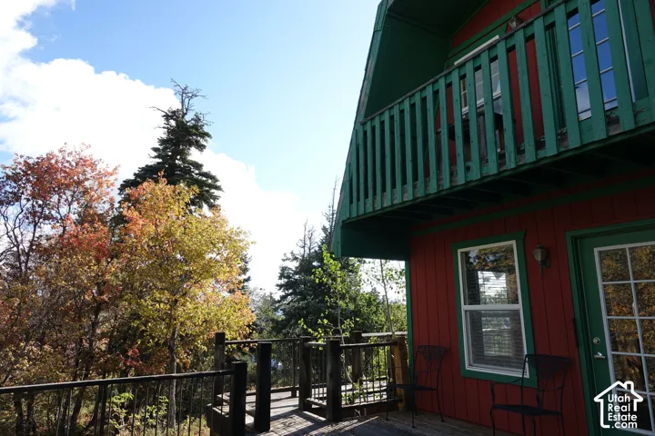 Red exterior siding with green trim