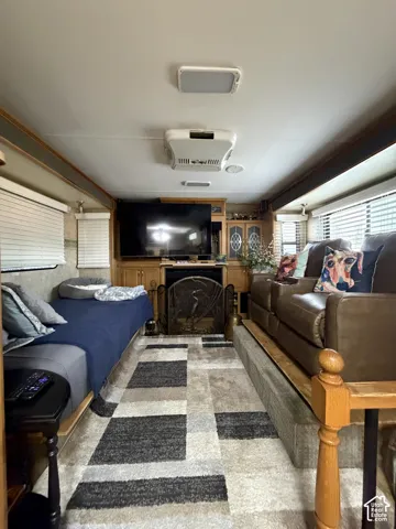Wood-finish cabinetry and trim throughout