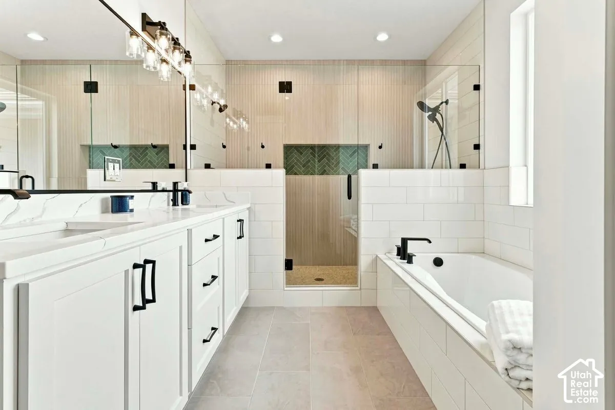 Dual vanity with undermount sinks, quartz countertops, and matte black fixtures