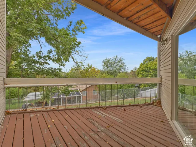 Wood-finish deck with metal railing