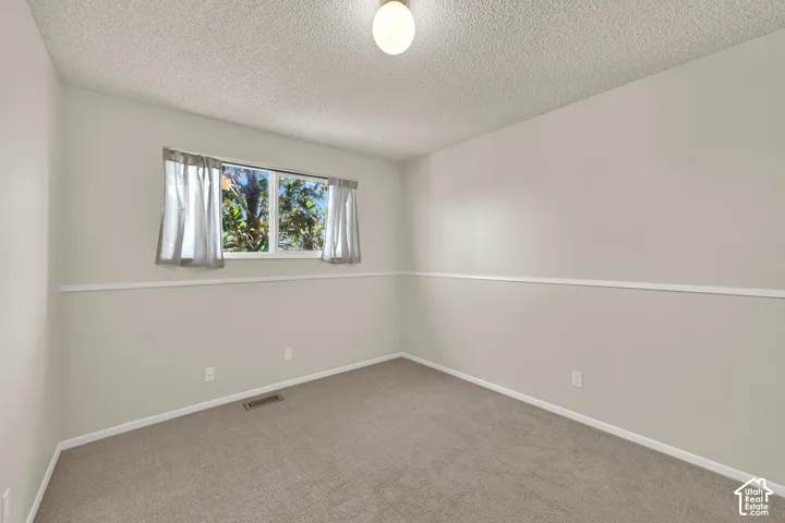 Second Bedroom with fresh paint and carpet