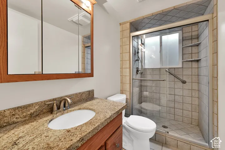 3/4 Bath downstairs with granite and tile