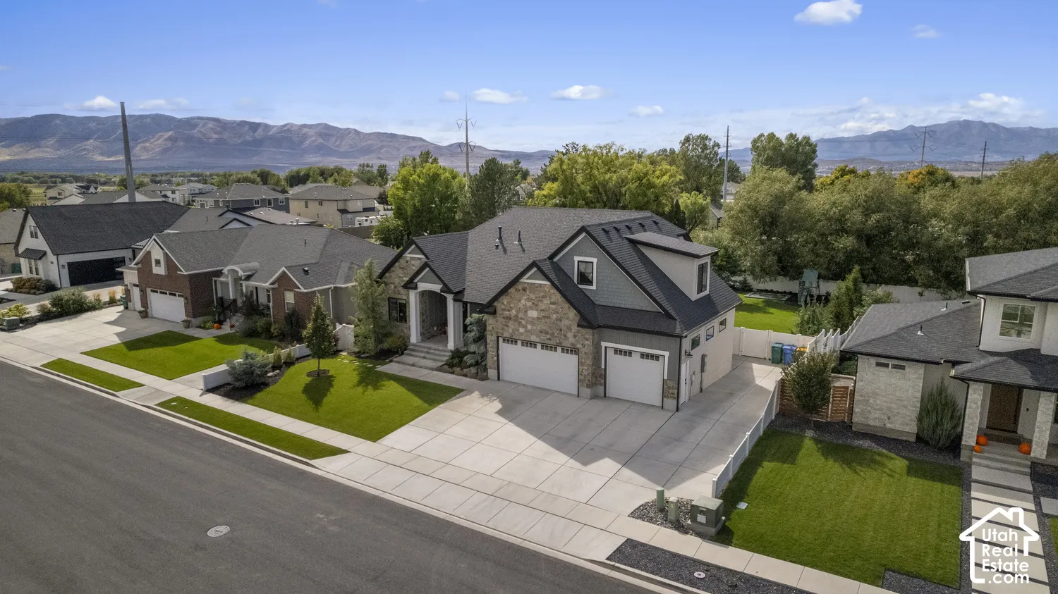 Modern-style exterior featuring stone and siding finishes
