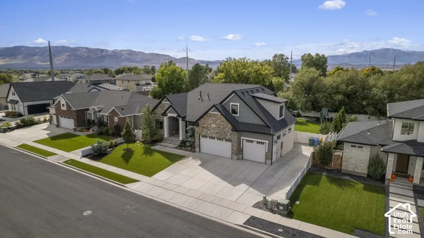 Modern-style exterior featuring stone and siding finishes
