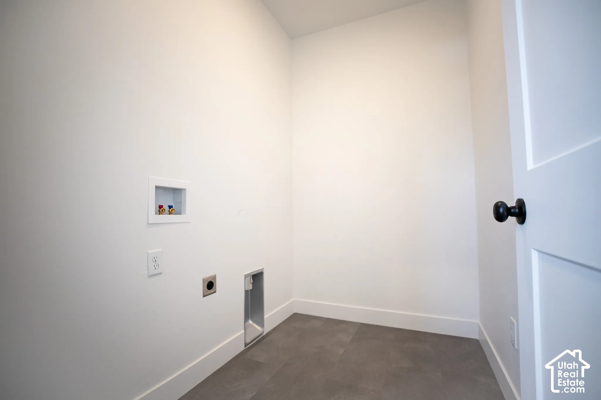 Full-size, dedicated laundry room.