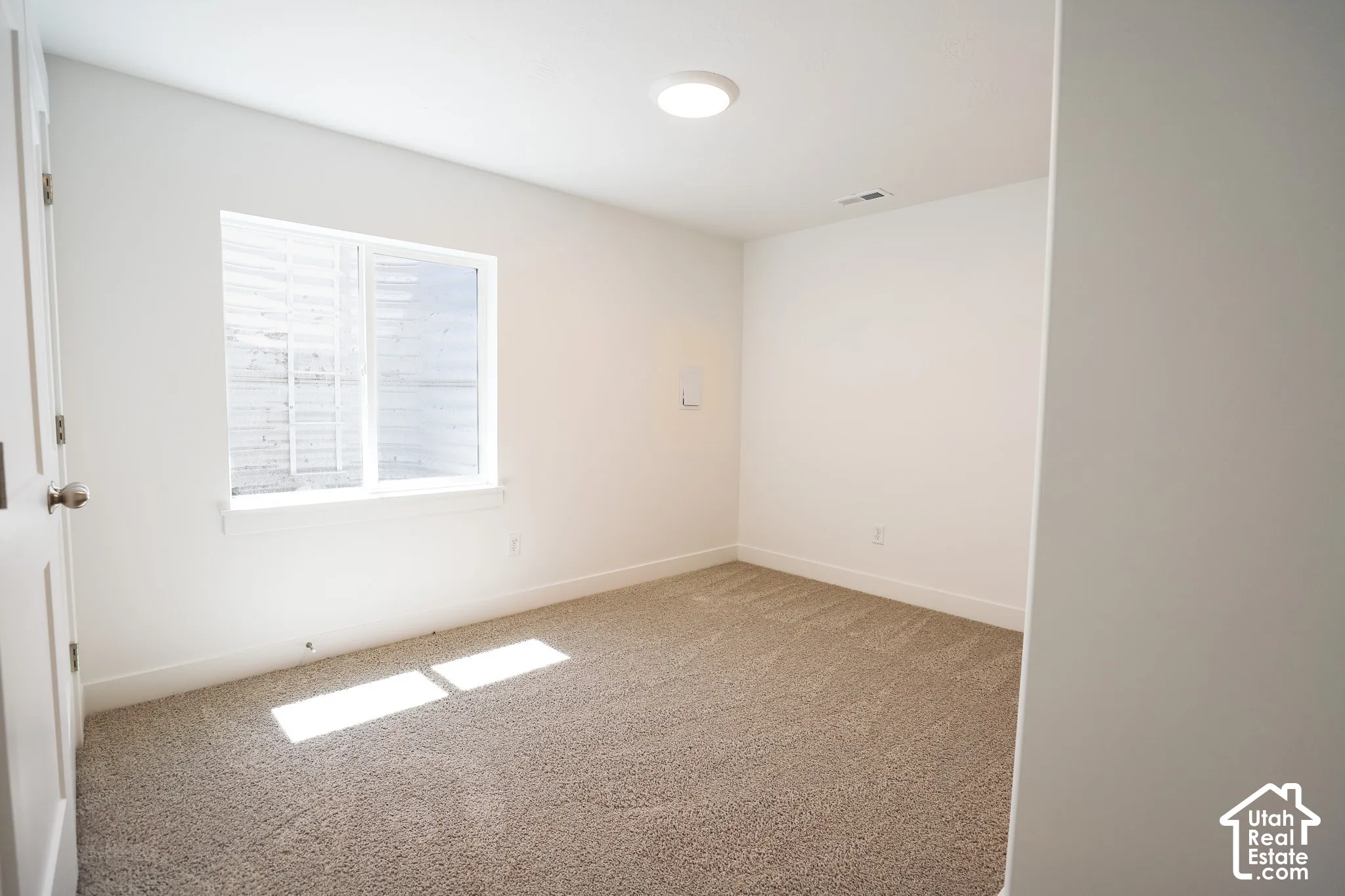 Bedroom #3 with large closet as part of fully-finished basement.