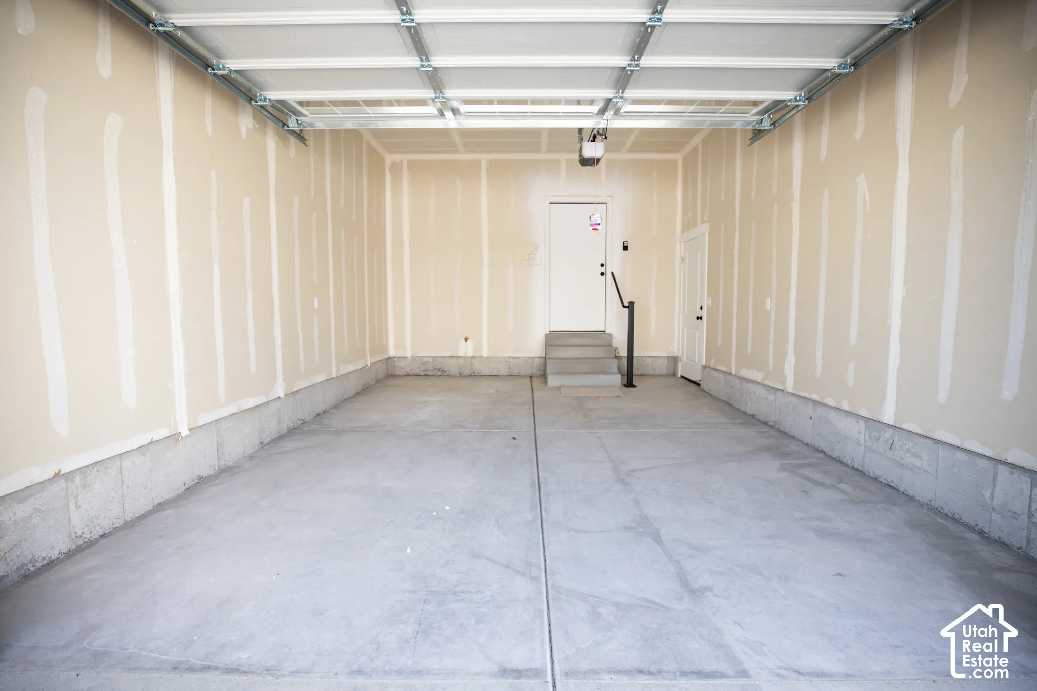 One car garage with extra space for storage.