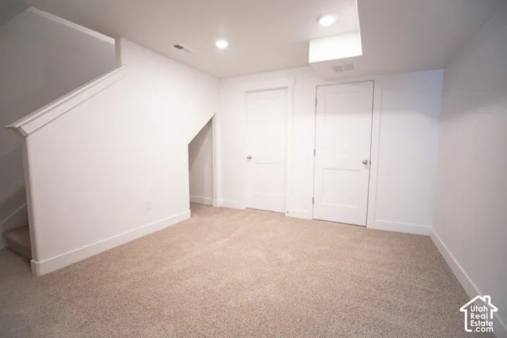 Family room as part of fully-finished basement.