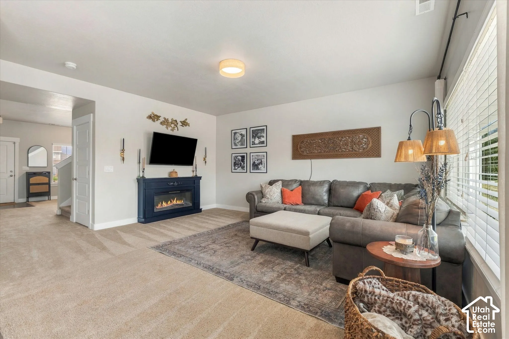 Recessed lighting, wood-finish flooring, and a built-in fireplace