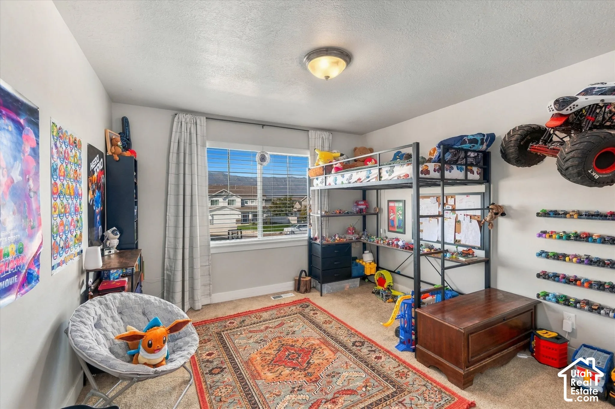 Carpeted flooring, a window with blinds, a metal bunk bed, and a flush mount ceiling light