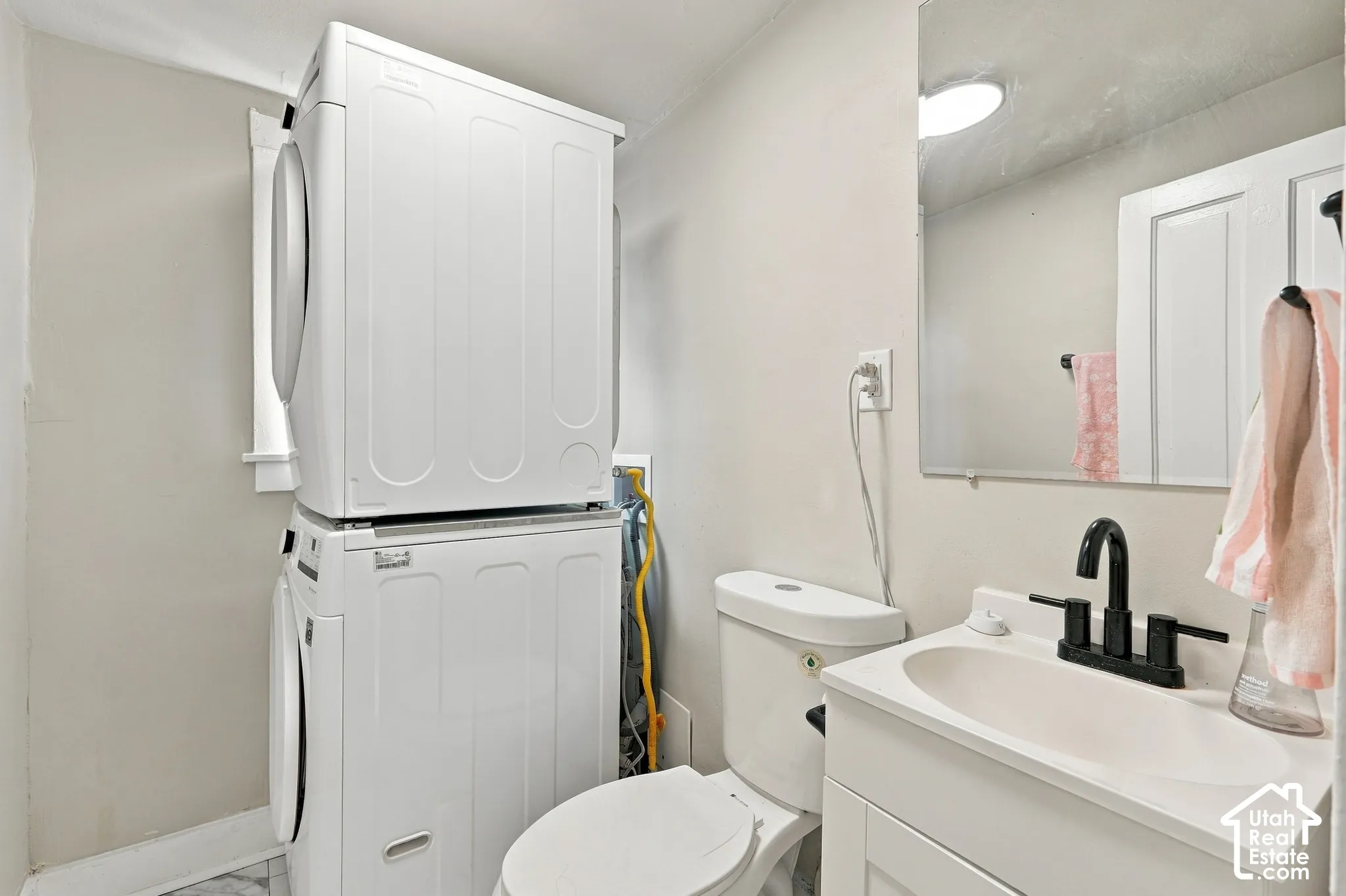 Single Family Home - Half Bathroom and Laundry Room