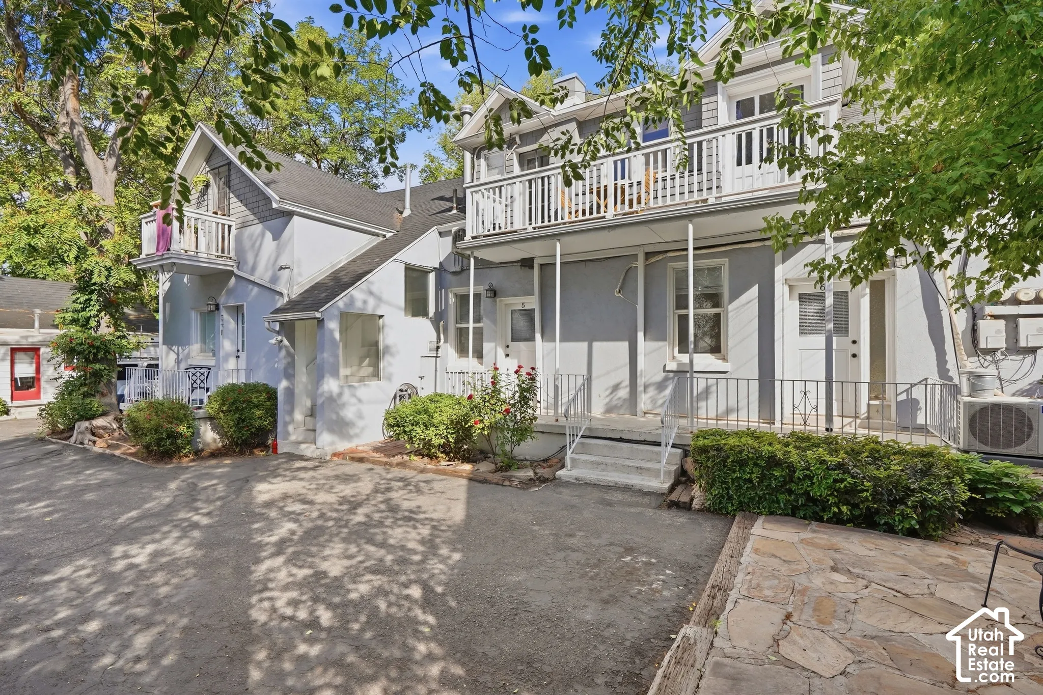 6-Plex Unit located behind the single family home.