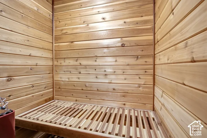 Wood-paneled interior with built-in wooden slatted bench