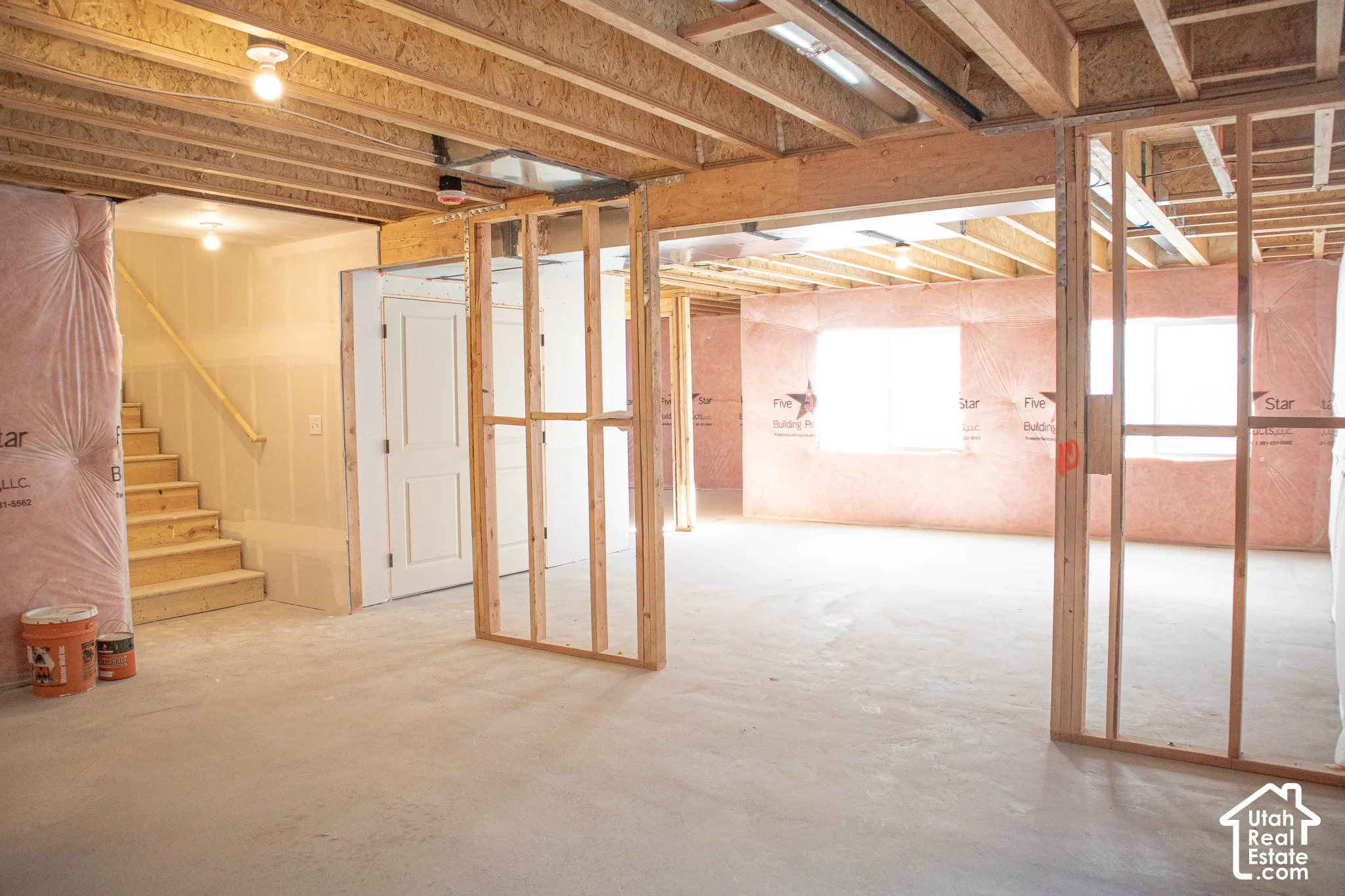 Unfinished basement with potential for large family/game room, full bathroom and three bedrooms.