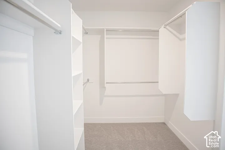Terrific walk-in closet as part of primary suite.