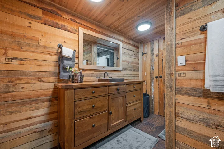 Wood-paneled walls and ceiling