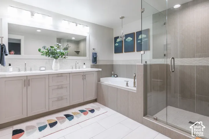 Dual vanity with a white countertop and rectangular sinks