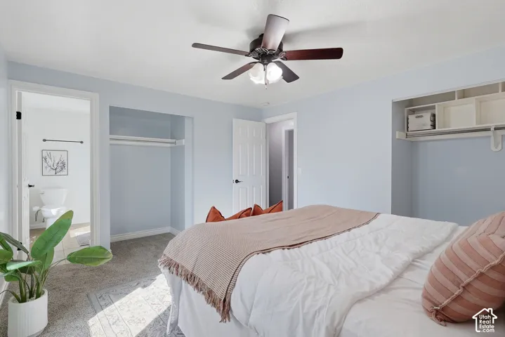 Neutral wall tones, ceiling fan with integrated lighting, and carpeted flooring
