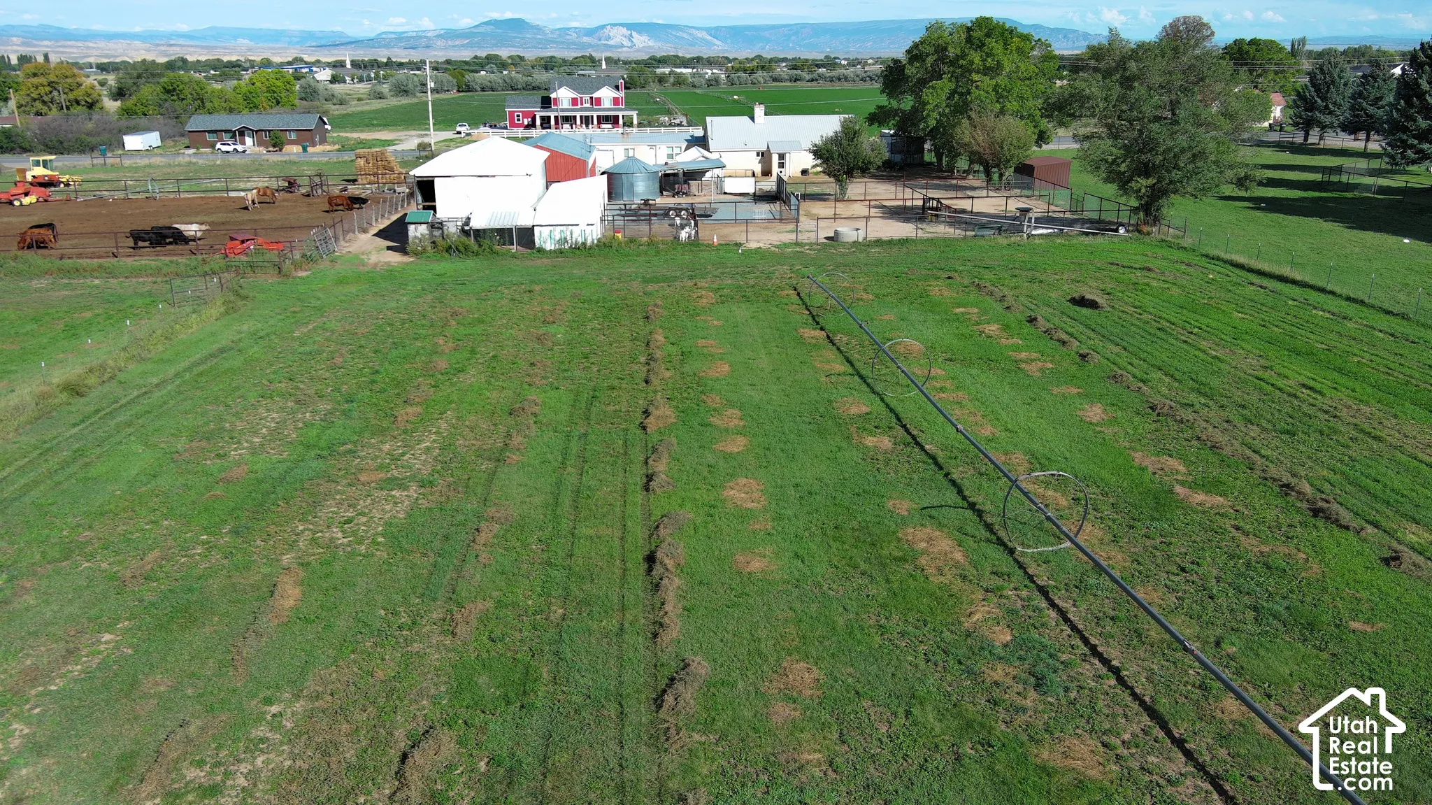 Expansive green acreage with irrigation lines