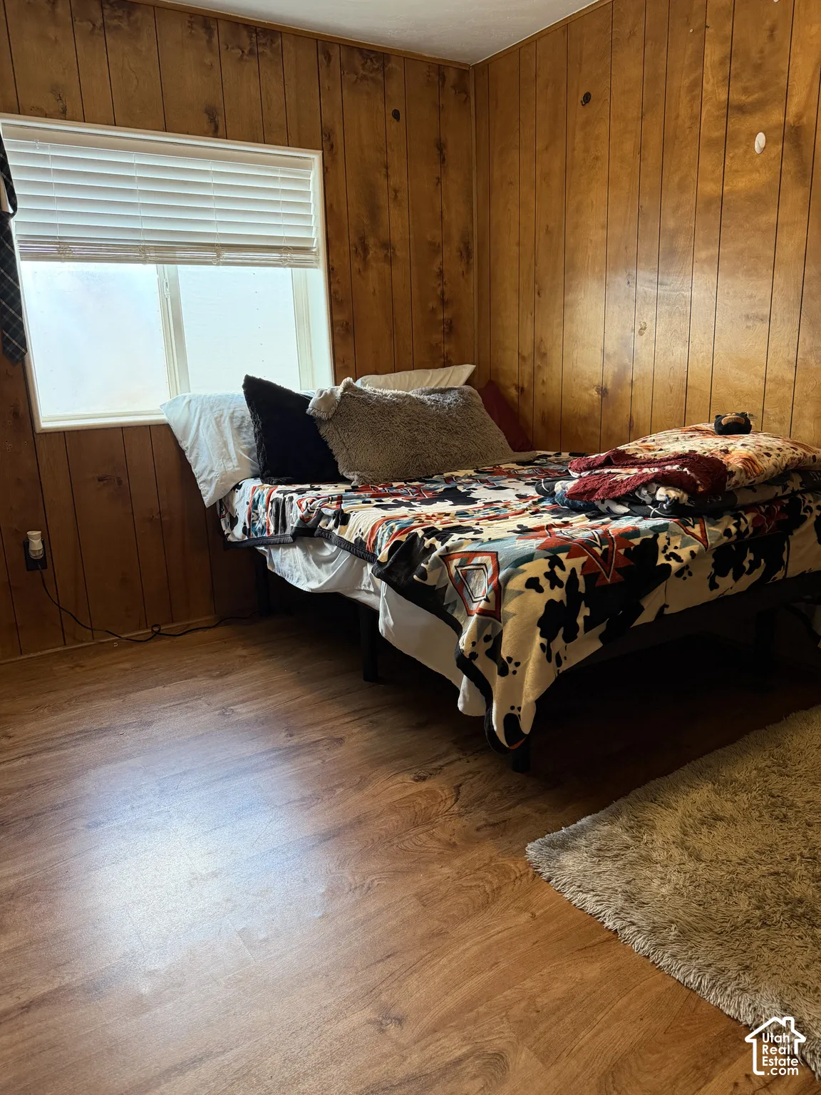 Wood-finish flooring and paneled walls