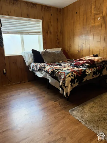 Wood-finish flooring and paneled walls