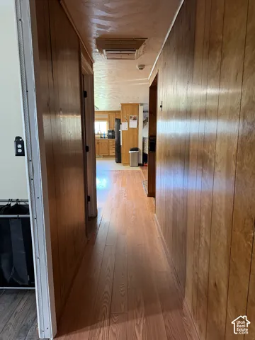 Wood-finish flooring with wood paneling