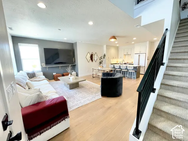 Hardwood-style flooring throughout the main living area