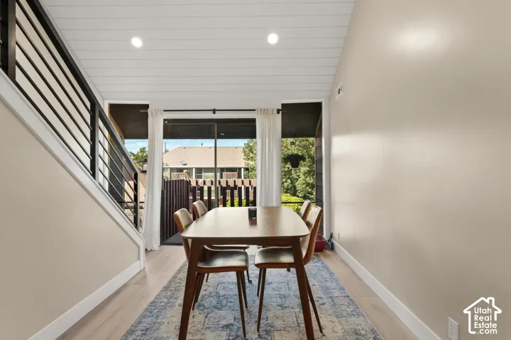 Recessed lighting illuminates the shiplap ceiling