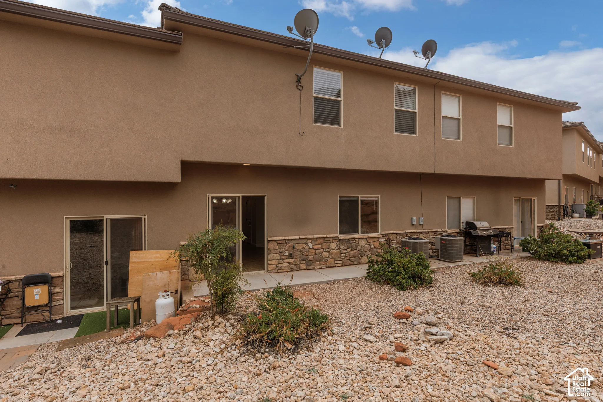 Stucco exterior with stone accent detailing