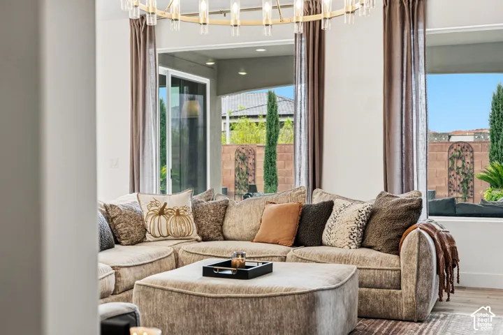 Large format glass sliding doors and windows with full-length drapery