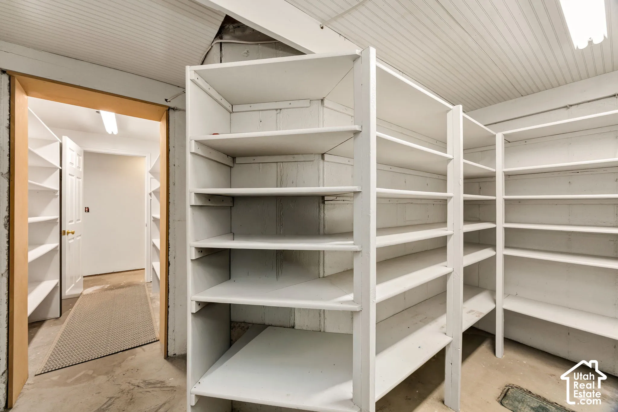 Extensive built-in shelving providing ample storage