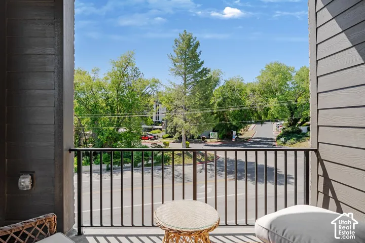 Balcony with black metal railing