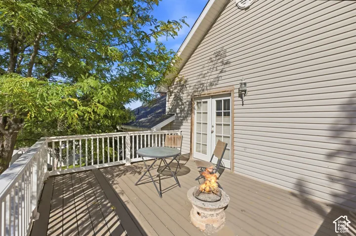Expansive deck featuring composite decking and white railing