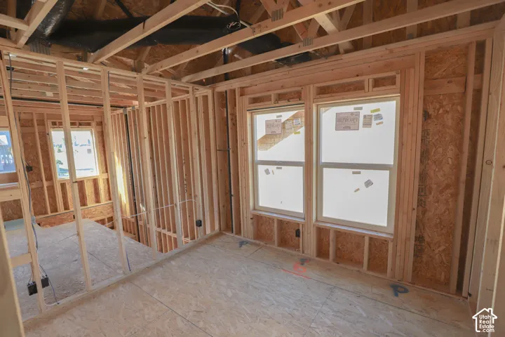 New construction framing with dual pane windows and engineered wood subflooring