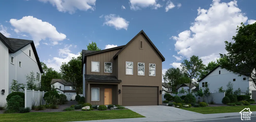 Contemporary two-story exterior with a prominent gable, attached garage, covered entry, and a paved driveway