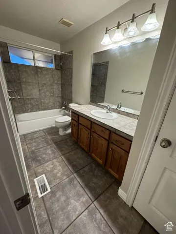 Tile flooring and a coordinating tiled bath surround