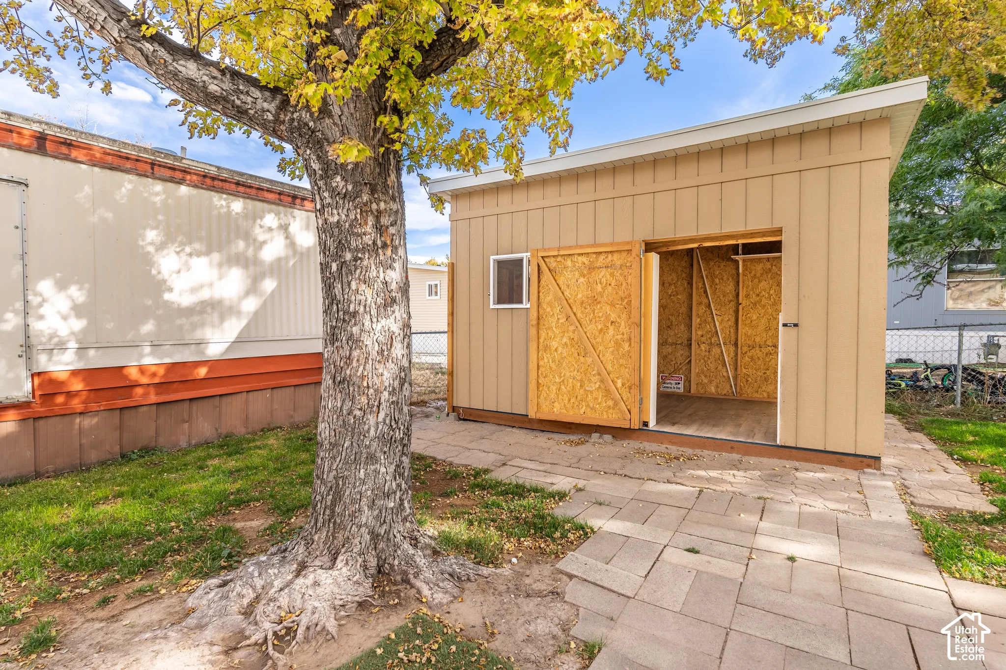 Wood-sided storage shed