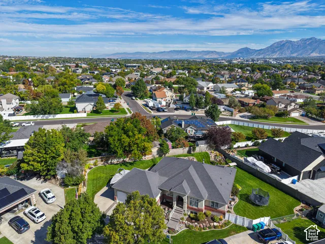 Expansive residential area with a distinct mountain backdrop
