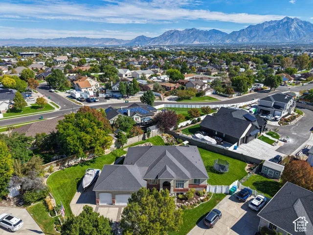 Expansive mountain backdrop with a residential neighborhood