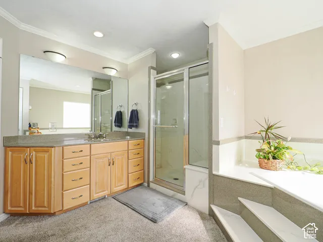 Dual vanity with wood-finish cabinetry and light-toned countertops