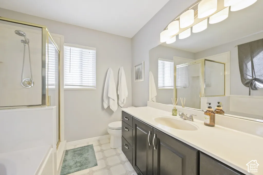 Built-in vanity with under-sink cabinetry, integrated sink, and extended countertop