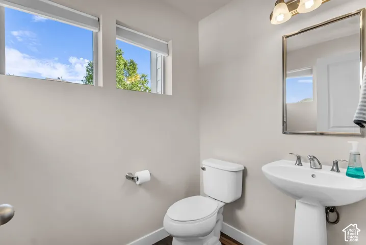 Half bathroom with pedestal sink