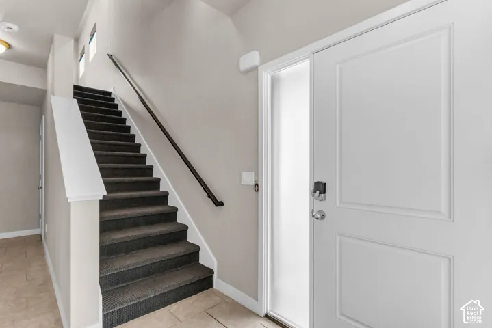 Entryway and stairs to main living area