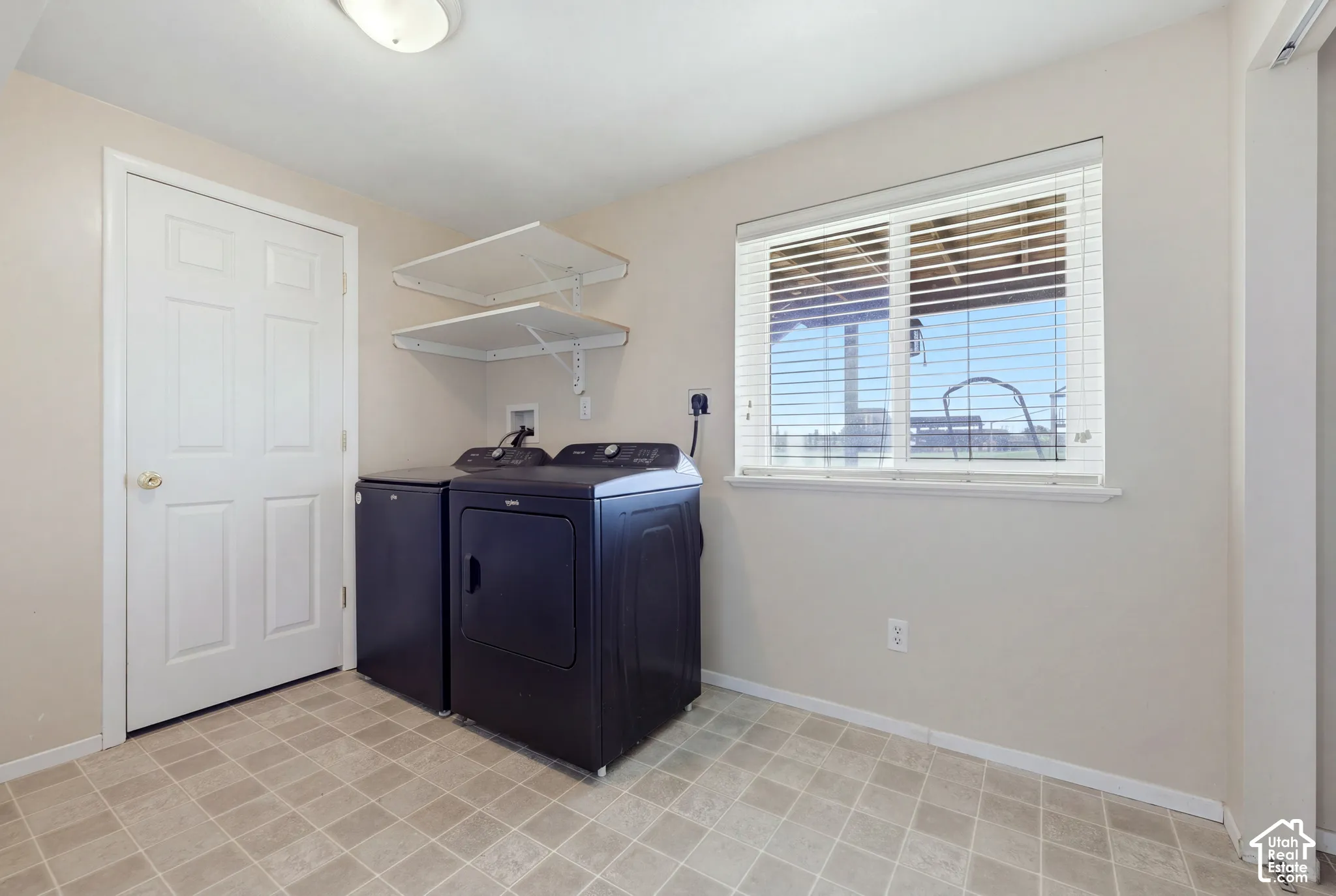 Extra large laundry room. Dry storage through that door.