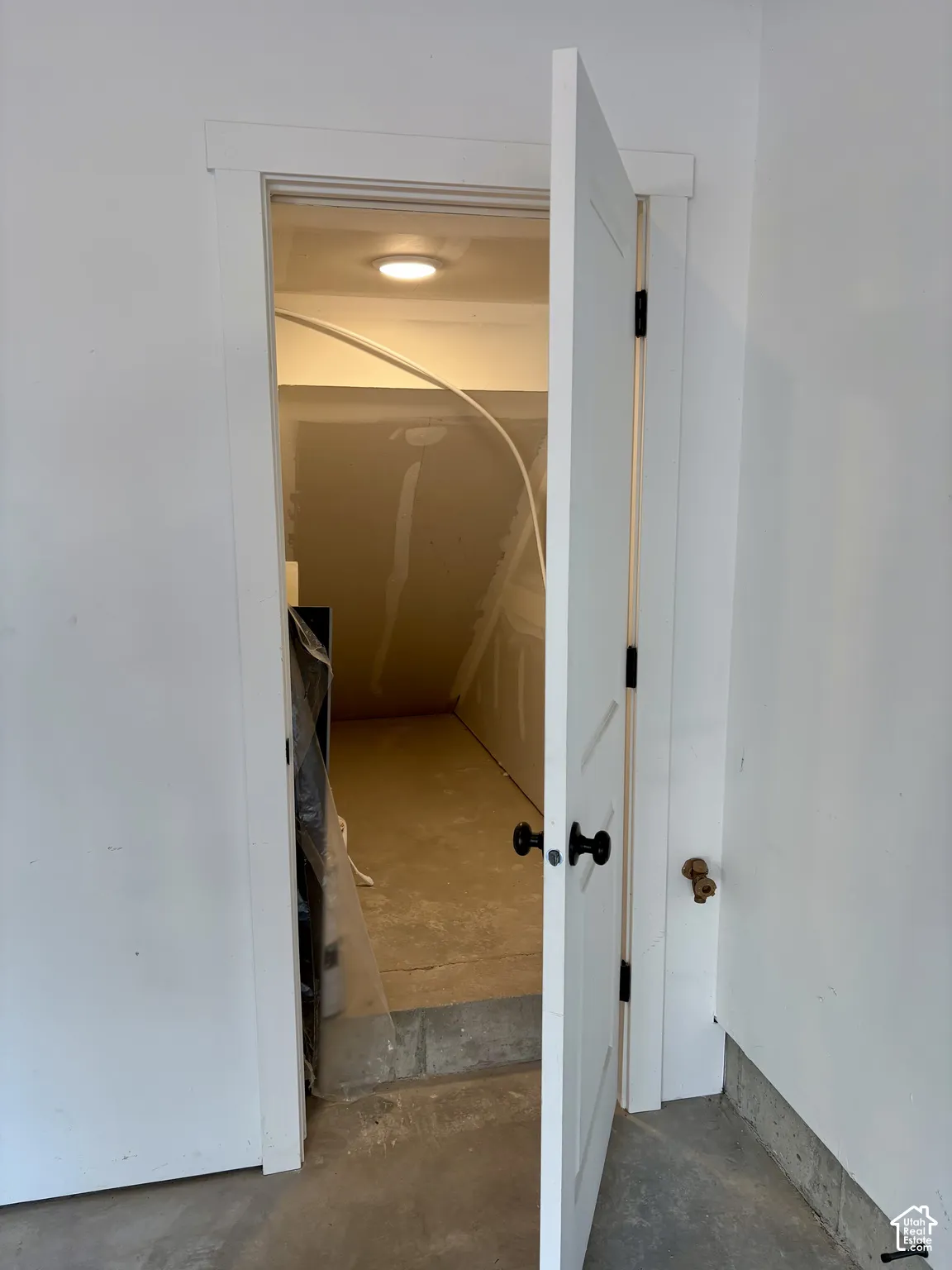Garage storage closet crawl space