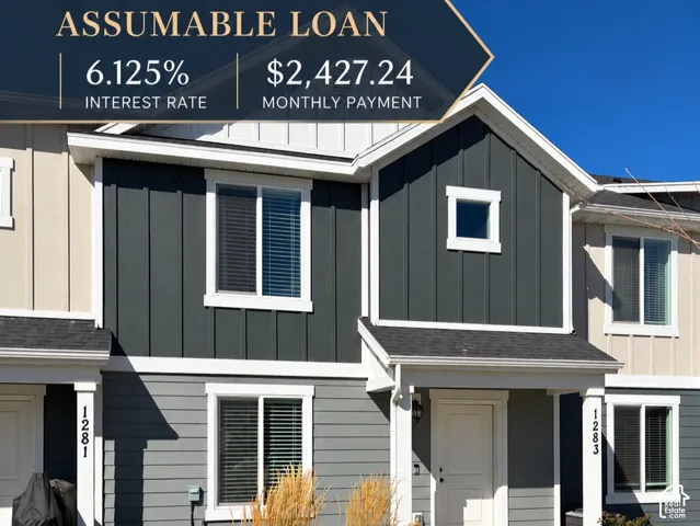 Two-story exterior with dark gray vertical and horizontal siding