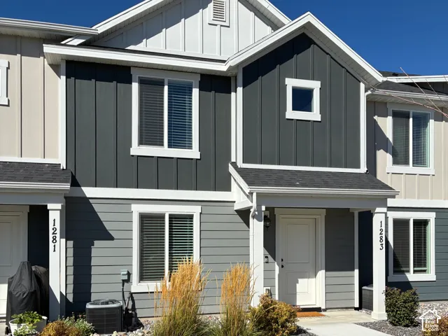 Cement Board and Vinyl Siding; Fully Landscaped and Covered Entry.