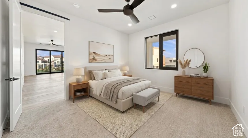 Recessed lighting, a dark-toned ceiling fan, and a large window with dark trim